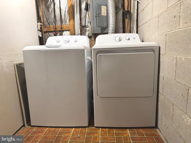 a utility room with dryer and washer