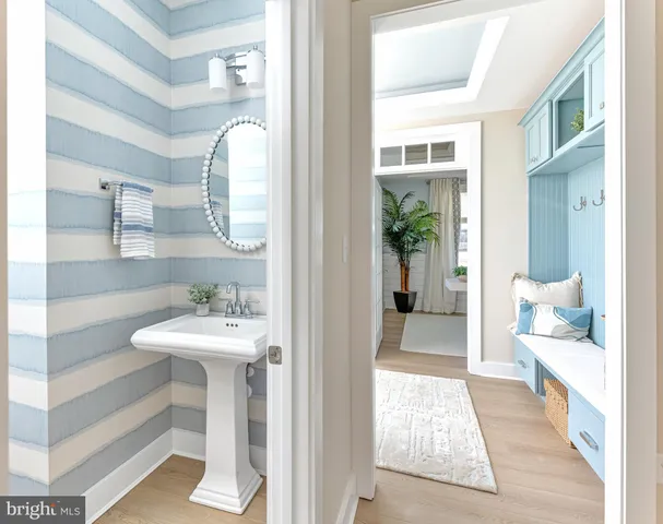 a en suite bathroom with a sink and a mirror