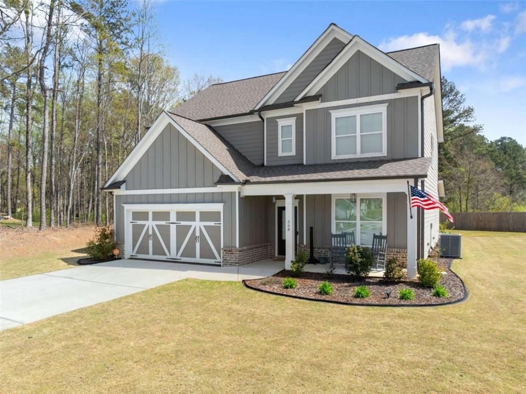 568 Dunagan Court Winder, GA 30680 - Photo 2 of 61 a front view of a house with a yard