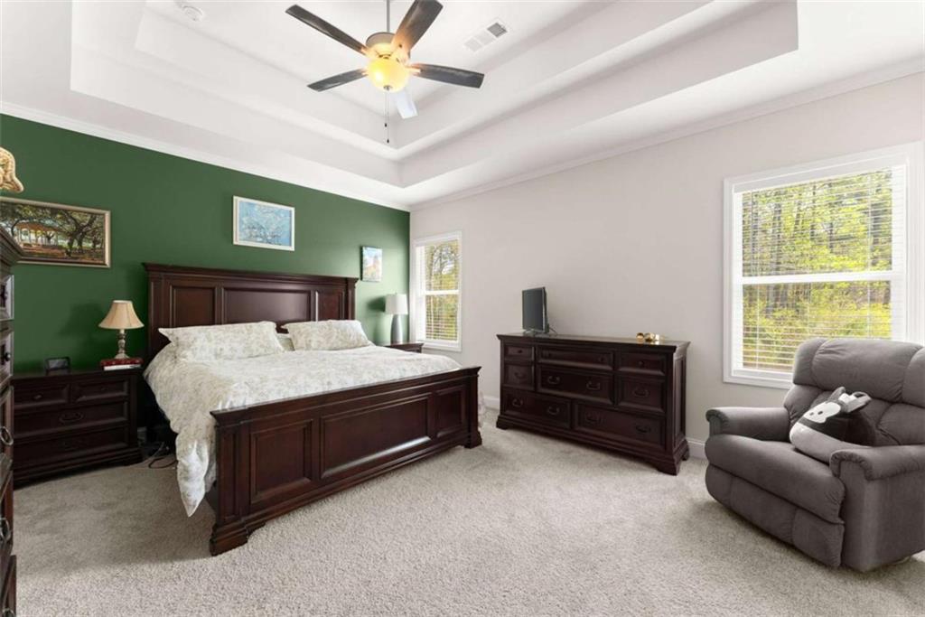 568 Dunagan Court Winder, GA 30680 - Photo 26 of 61 a bedroom with a bed and window