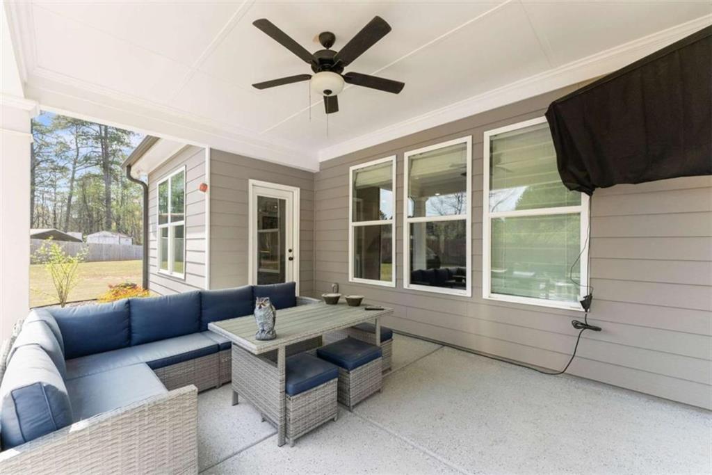 568 Dunagan Court Winder, GA 30680 - Photo 43 of 61 a living room with furniture and a large window