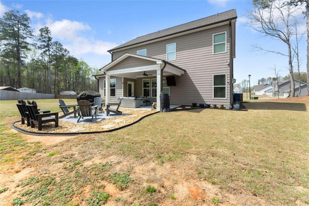 568 Dunagan Court Winder, GA 30680 - Photo 49 of 61 a view of a house with swimming pool and sitting area
