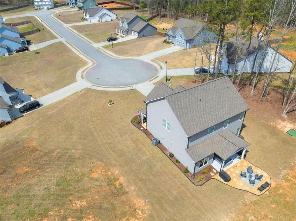 568 Dunagan Court Winder, GA 30680 - Photo 52 of 61 an aerial view of a house with a swimming pool and outdoor seating