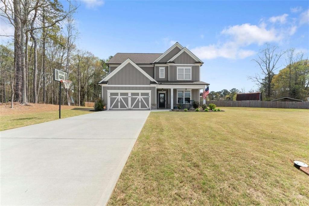 568 Dunagan Court Winder, GA 30680 - Photo 9 of 61 a view of a house with a swimming pool