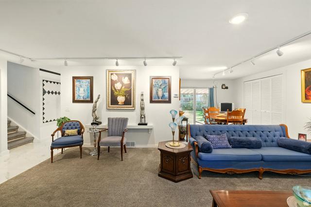 1188 600 East Logan, UT 84341 - Photo 5 of 16 Living room featuring rail lighting and carpet floors