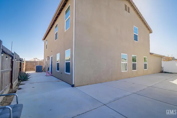 a view of a house with a street