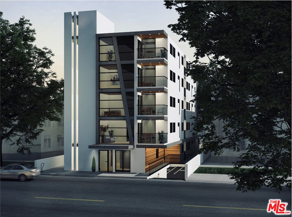 10918 Camarillo Street, Unit 103 North Hollywood, CA 91602 - Photo 1 of 38 front view of a house with a street