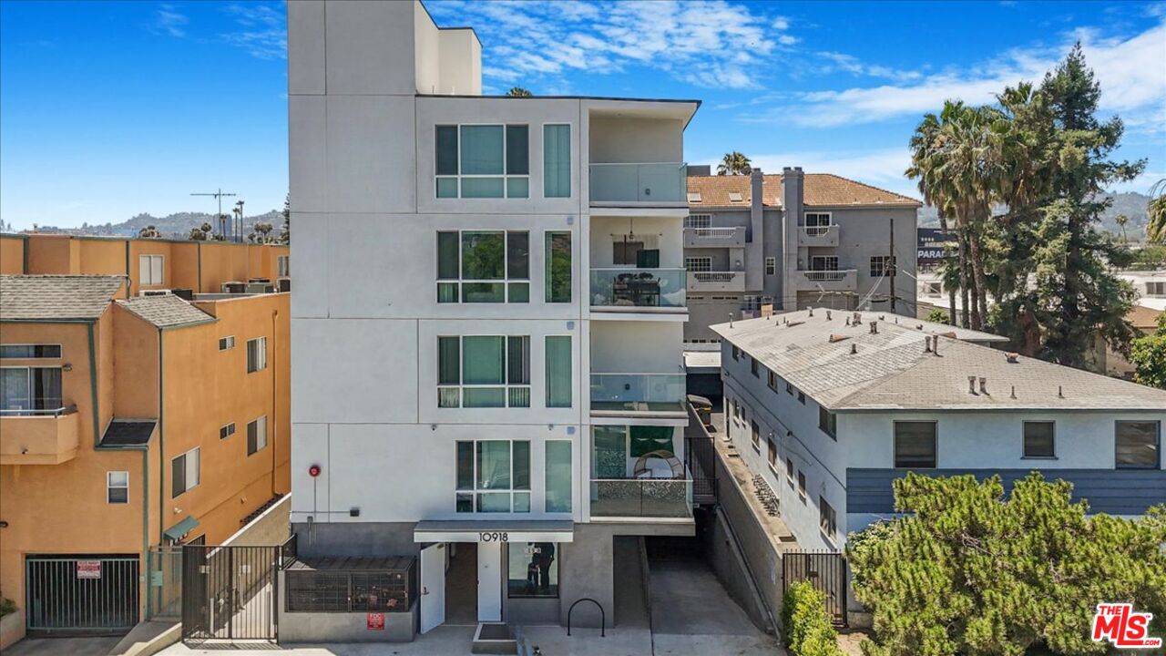 10918 Camarillo Street, Unit 103 North Hollywood, CA 91602 - Photo 2 of 38 a view of a building with a window and entryway