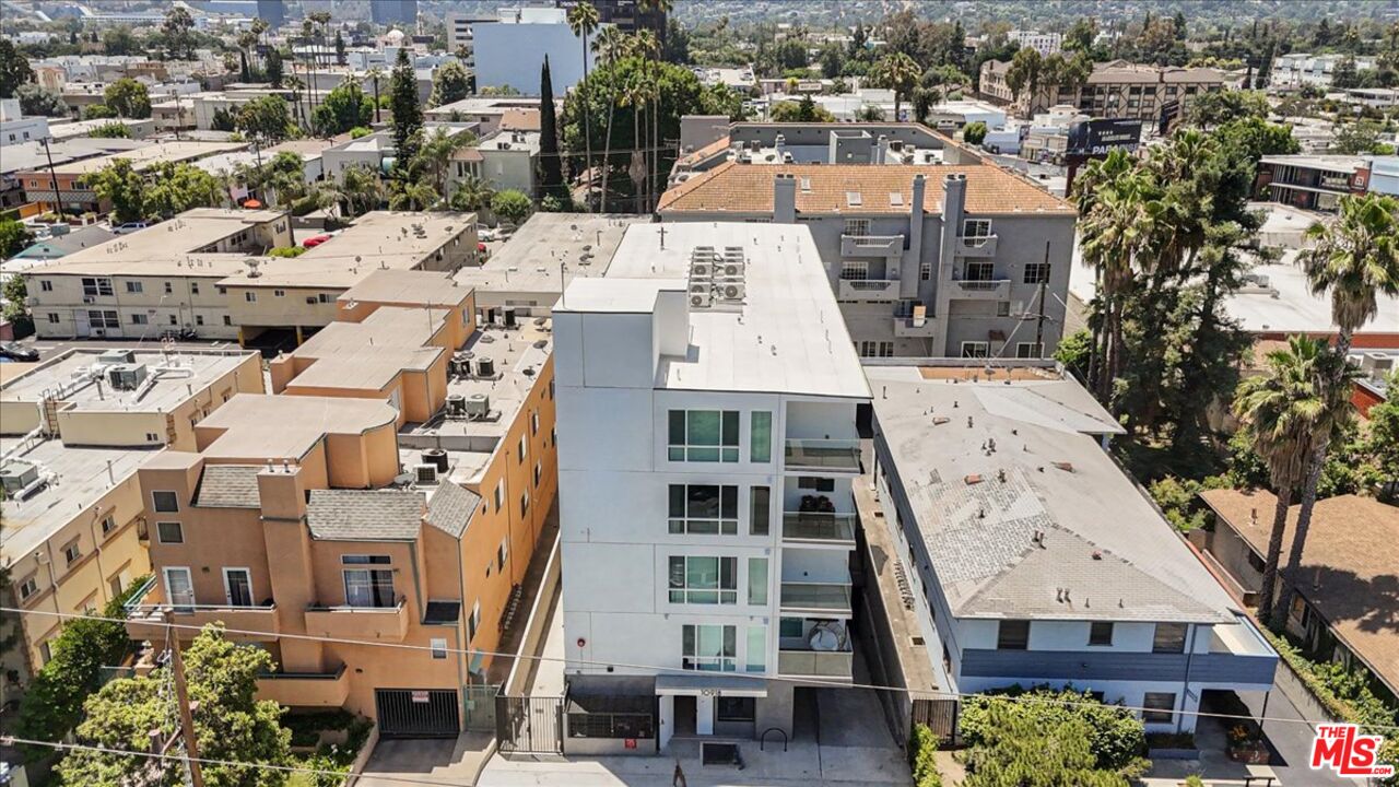 10918 Camarillo Street, Unit 103 North Hollywood, CA 91602 - Photo 3 of 38 an aerial view of residential houses with outdoor space