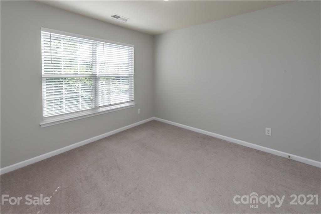 1435 Haverford Road Northwest Concord, NC 28027 - Photo 25 of 31 an empty room with a window