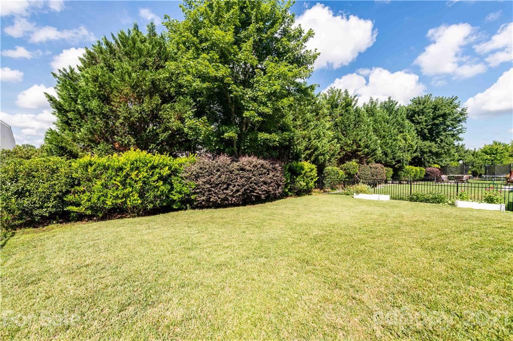 1435 Haverford Road Northwest Concord, NC 28027 - Photo 5 of 31 a view of a yard with an outdoor space