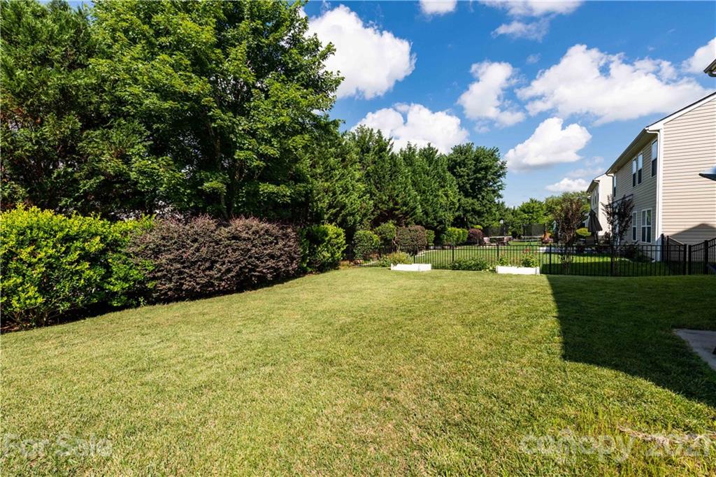 1435 Haverford Road Northwest Concord, NC 28027 - Photo 6 of 31 a view of a yard with yellow house