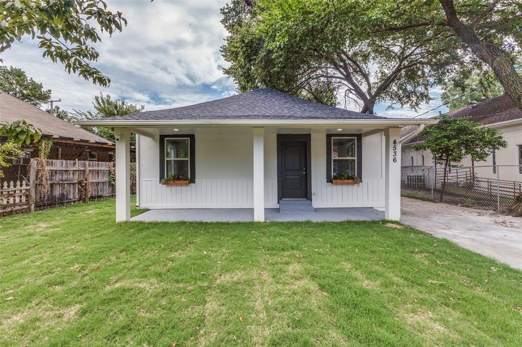 4536 Birch Street Dallas, TX 75223 - Photo 1 of 25 a front view of a house with a yard