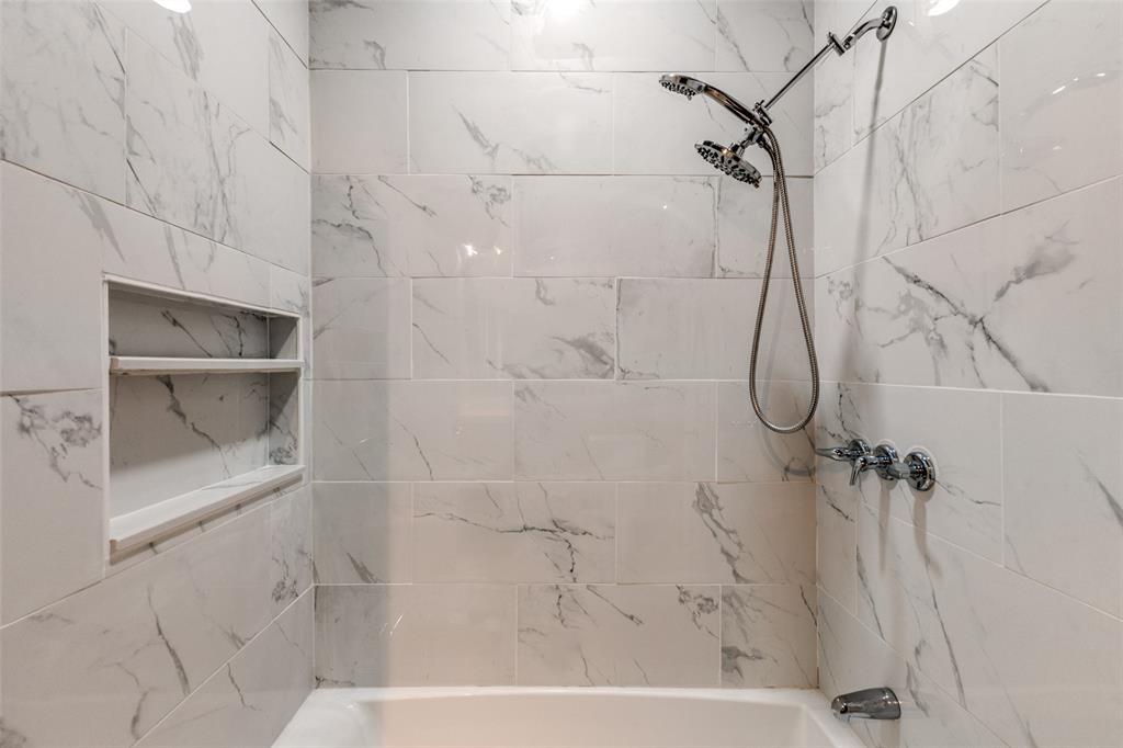 4536 Birch Street Dallas, TX 75223 - Photo 15 of 25 a bathroom with a shower