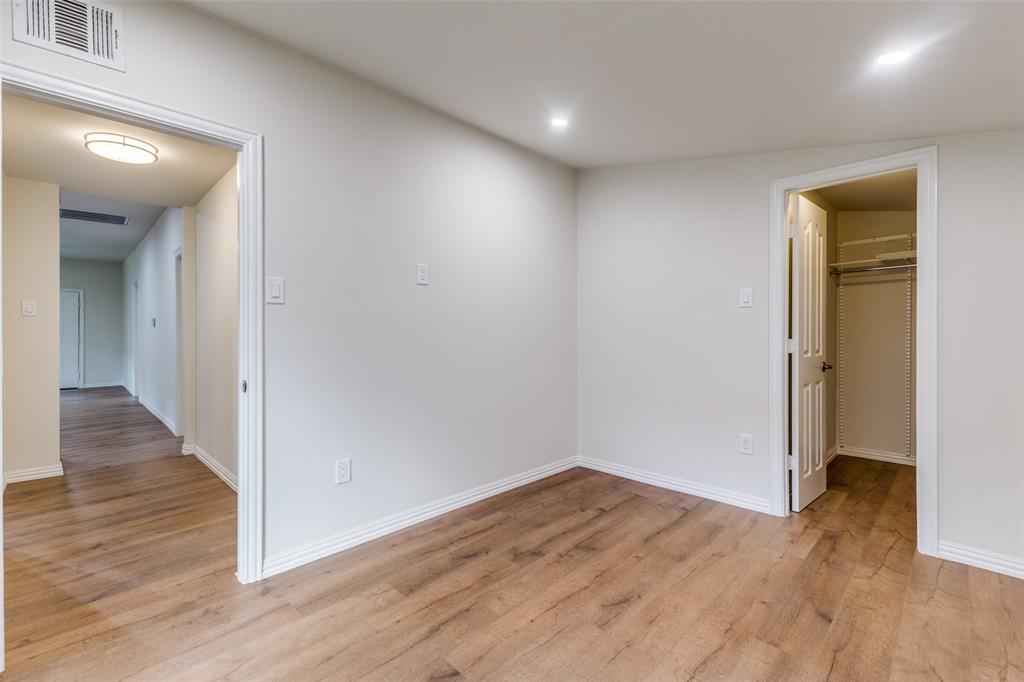 4536 Birch Street Dallas, TX 75223 - Photo 19 of 25 wooden floor in an empty room