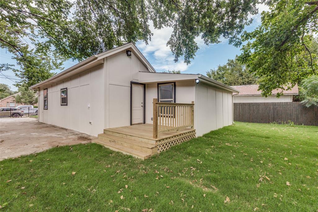 4536 Birch Street Dallas, TX 75223 - Photo 25 of 25 a white house that has tree in front of it