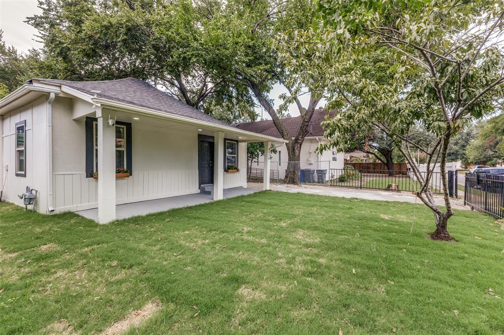 4536 Birch Street Dallas, TX 75223 - Photo 3 of 25 a view of a house with backyard and trees