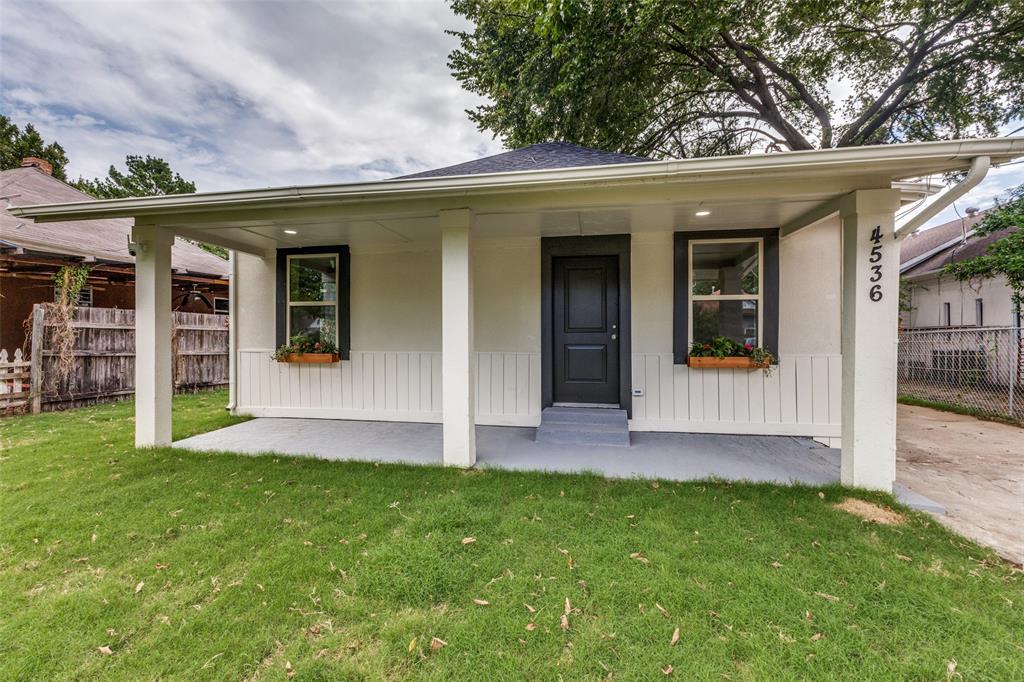 4536 Birch Street Dallas, TX 75223 - Photo 4 of 25 front view of a house with a yard
