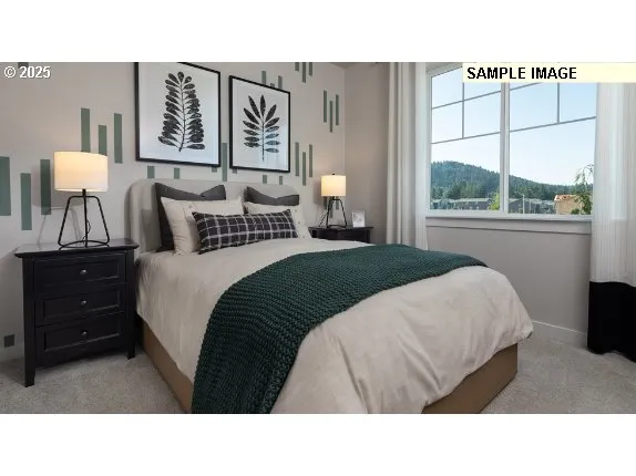 a living room with a bed furniture and a window