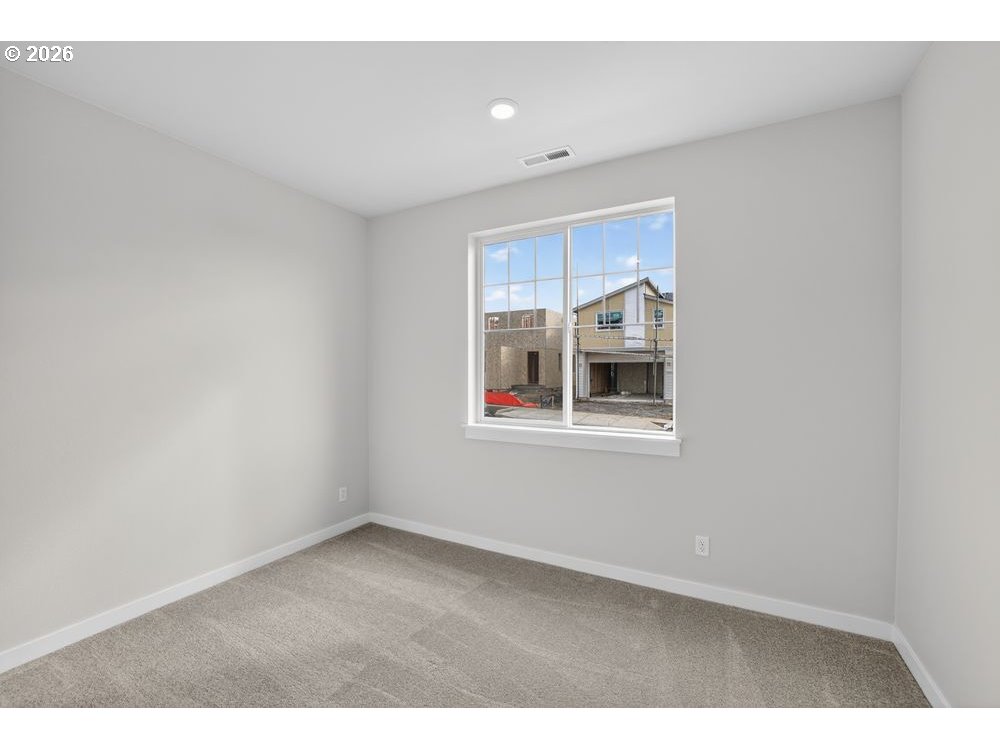 3649 Southwest 37th Street Gresham, OR 97080 - Photo 16 of 21 a view of an empty room with a window