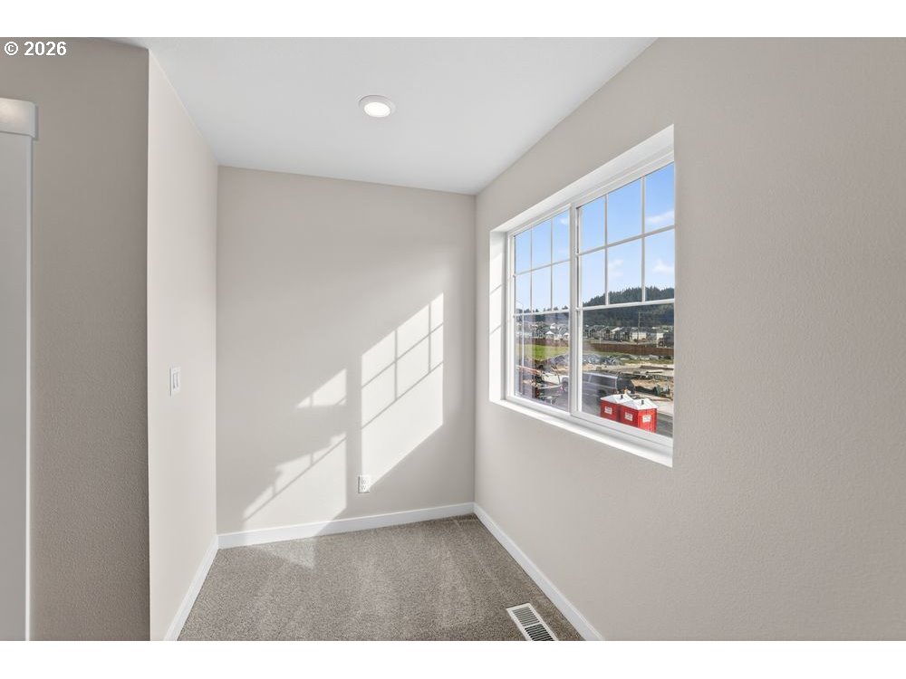 3649 Southwest 37th Street Gresham, OR 97080 - Photo 18 of 21 a view of an empty room with a window