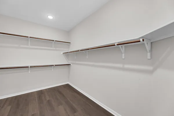 a view of an empty walk in closet