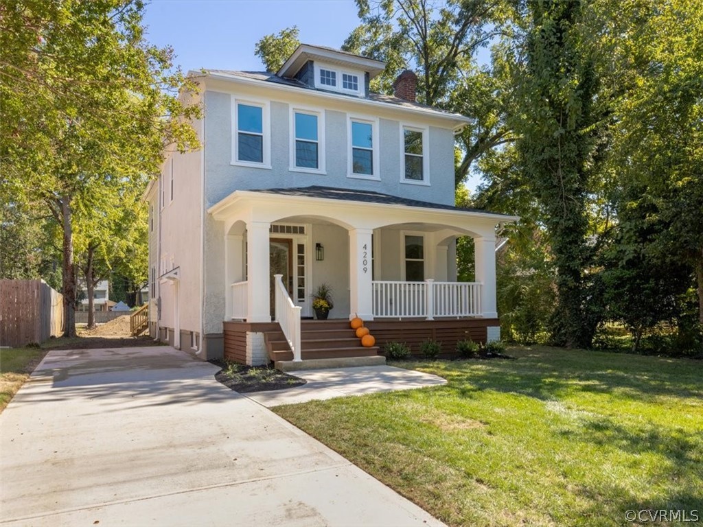 4209 Brook Road Richmond, VA 23227 - Photo 3 of 46 a front view of a house with a yard