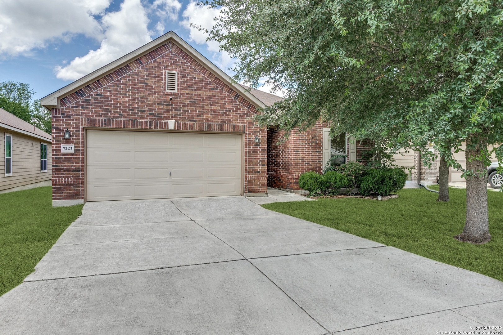 a front view of house with yard