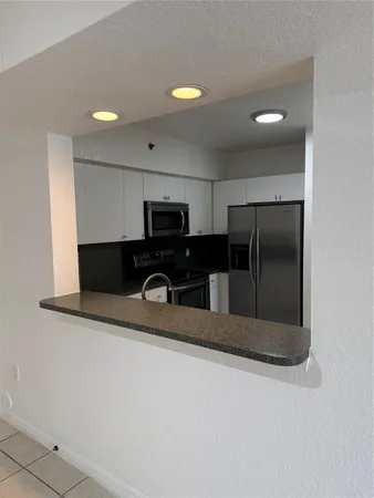 $347,000 | 9300 Fontainebleau Boulevard, Unit E101, Miami, FL 33172