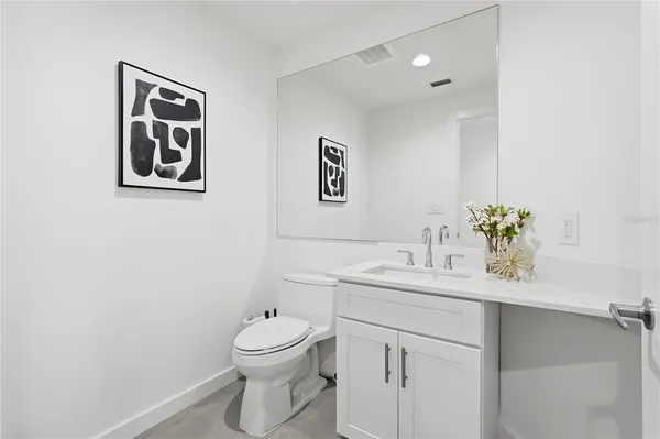 a view of a living room and floor to ceiling window
