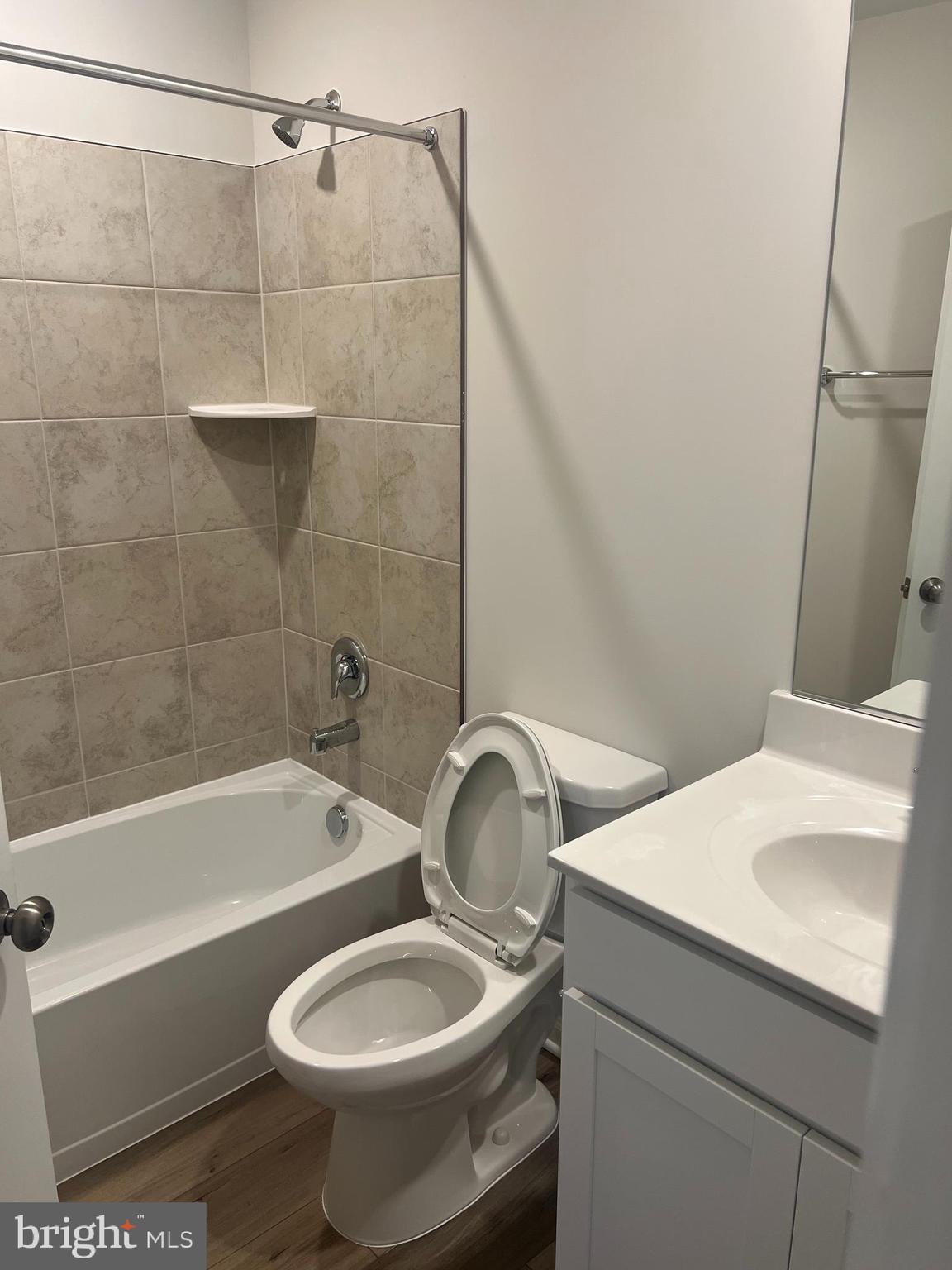 238 Cooperage Road Inwood, WV 25428 - Photo 21 of 27 a bathroom with a sink a toilet and bathtub