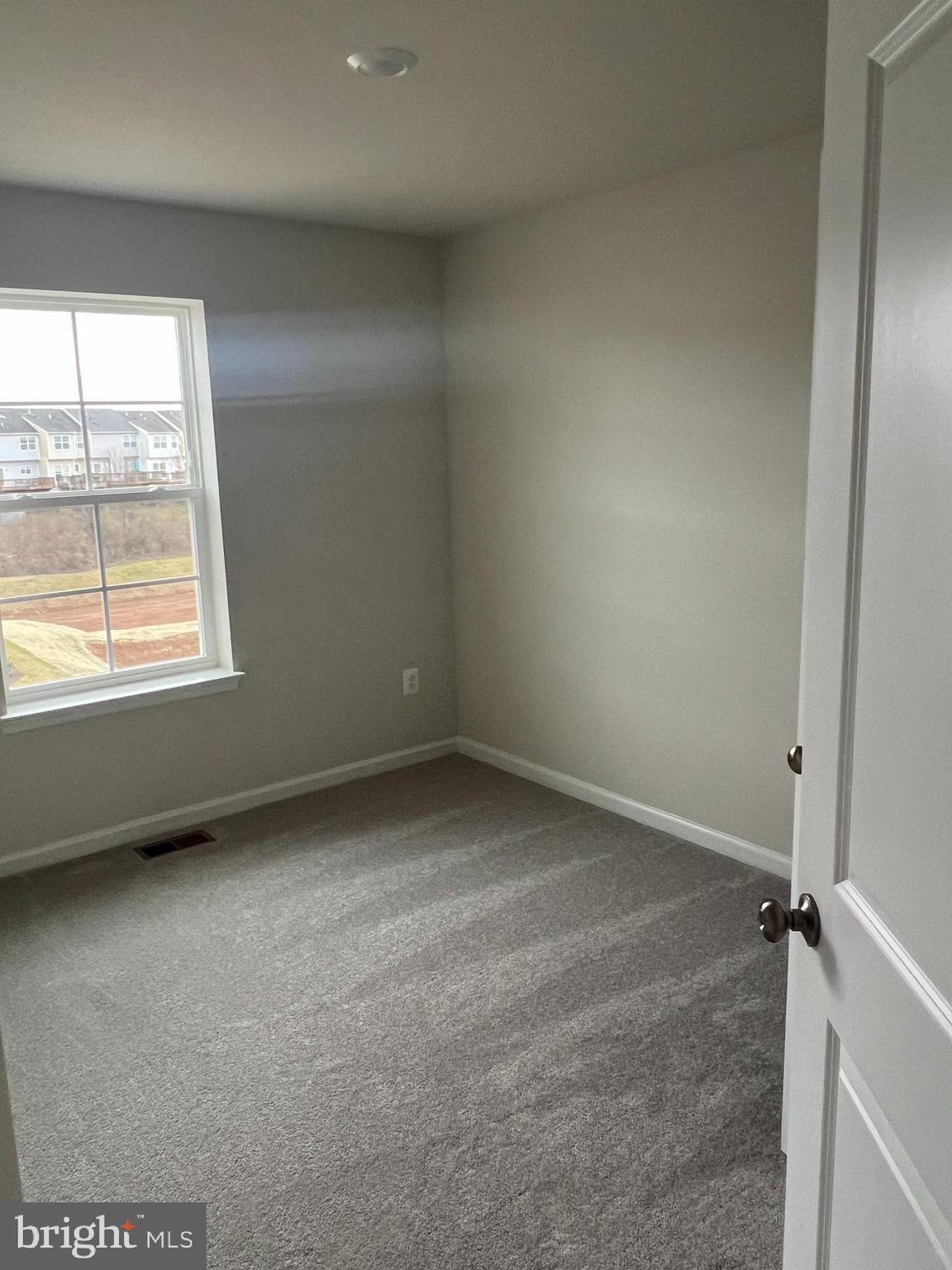 238 Cooperage Road Inwood, WV 25428 - Photo 23 of 27 an empty room with a window
