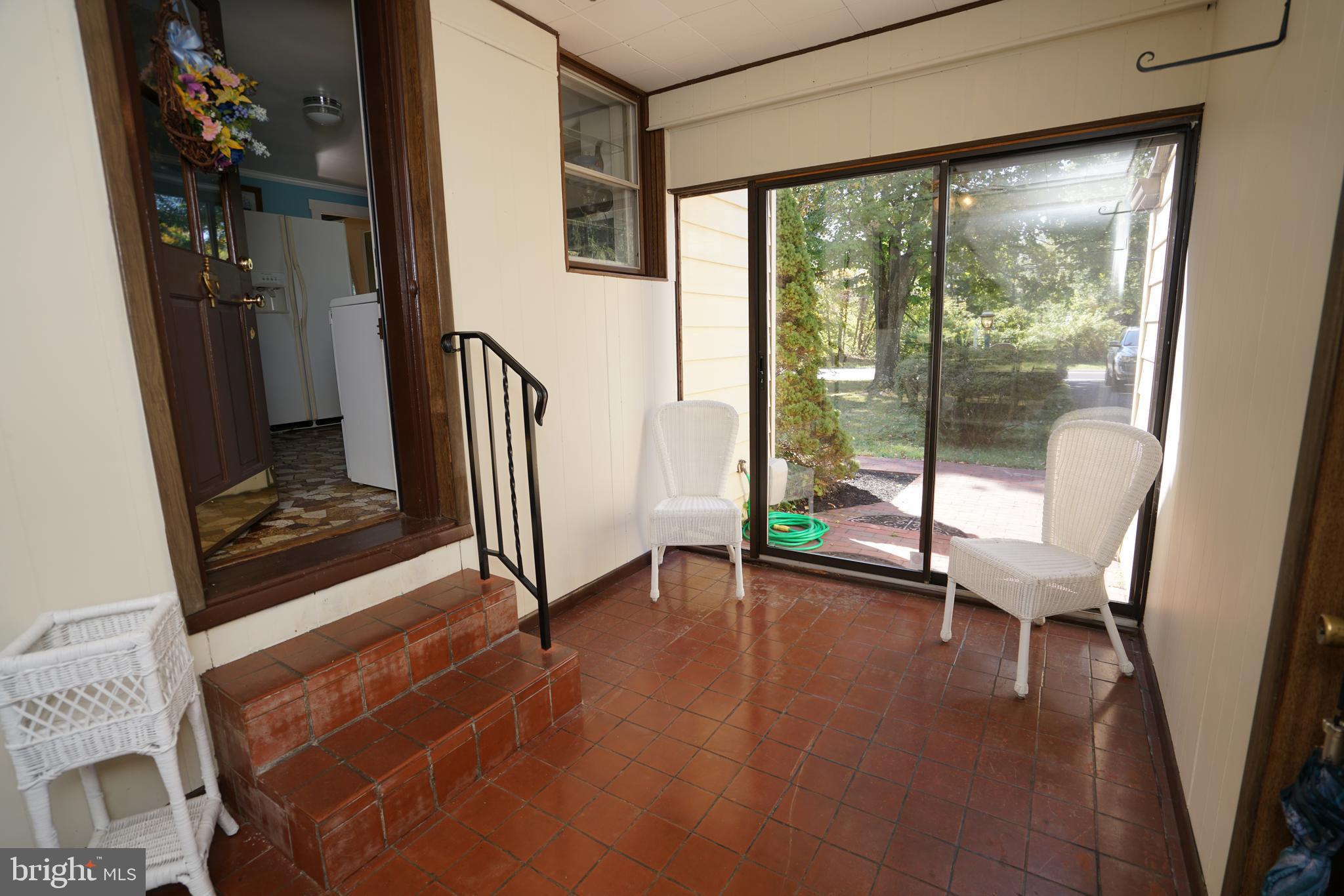 877 Almshouse Road Jamison, PA 18929 - Photo 29 of 43 Breezeway heated wioth sliders