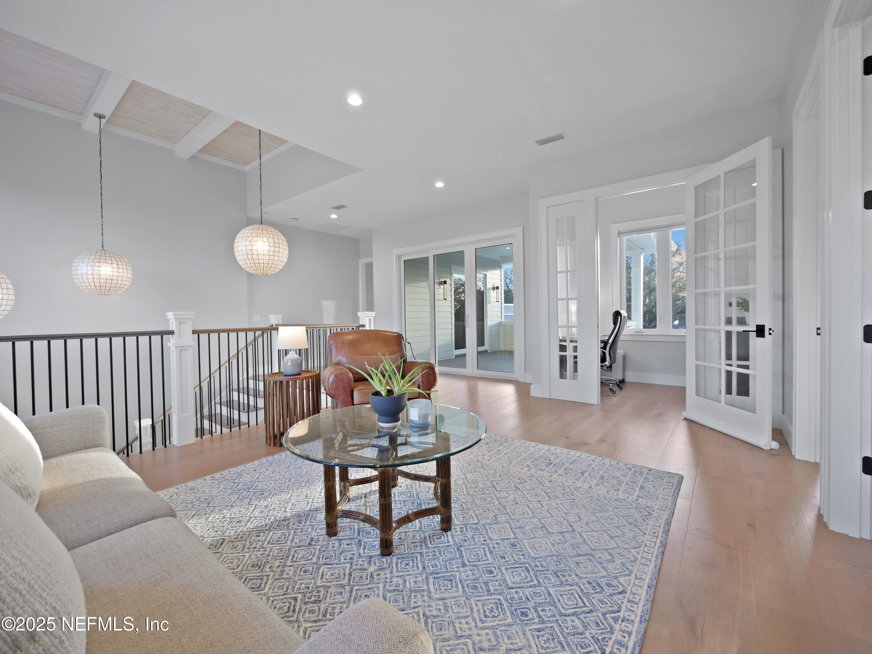 4021 Myrtle Street St. Augustine, FL 32084 - Photo 27 of 68 a living room with furniture and wooden floor