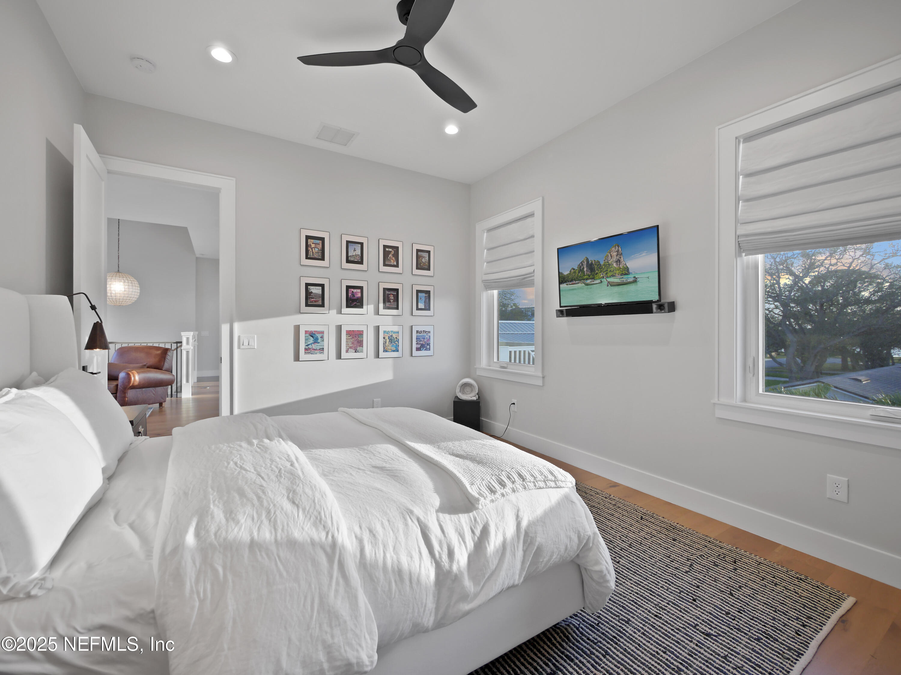 4021 Myrtle Street St. Augustine, FL 32084 - Photo 39 of 68 a bedroom with a large bed and a window