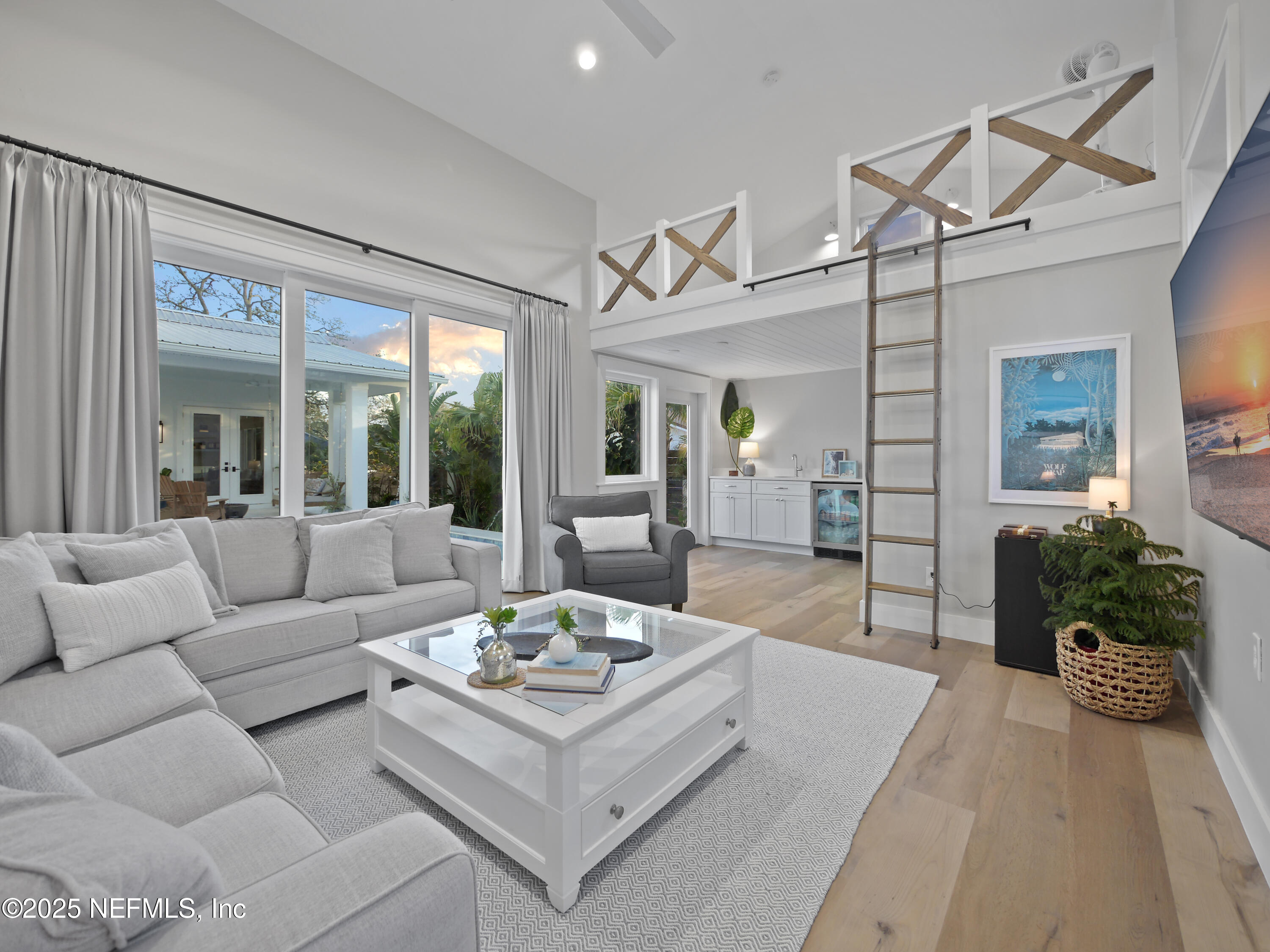 4021 Myrtle Street St. Augustine, FL 32084 - Photo 51 of 68 a living room with furniture and a large window