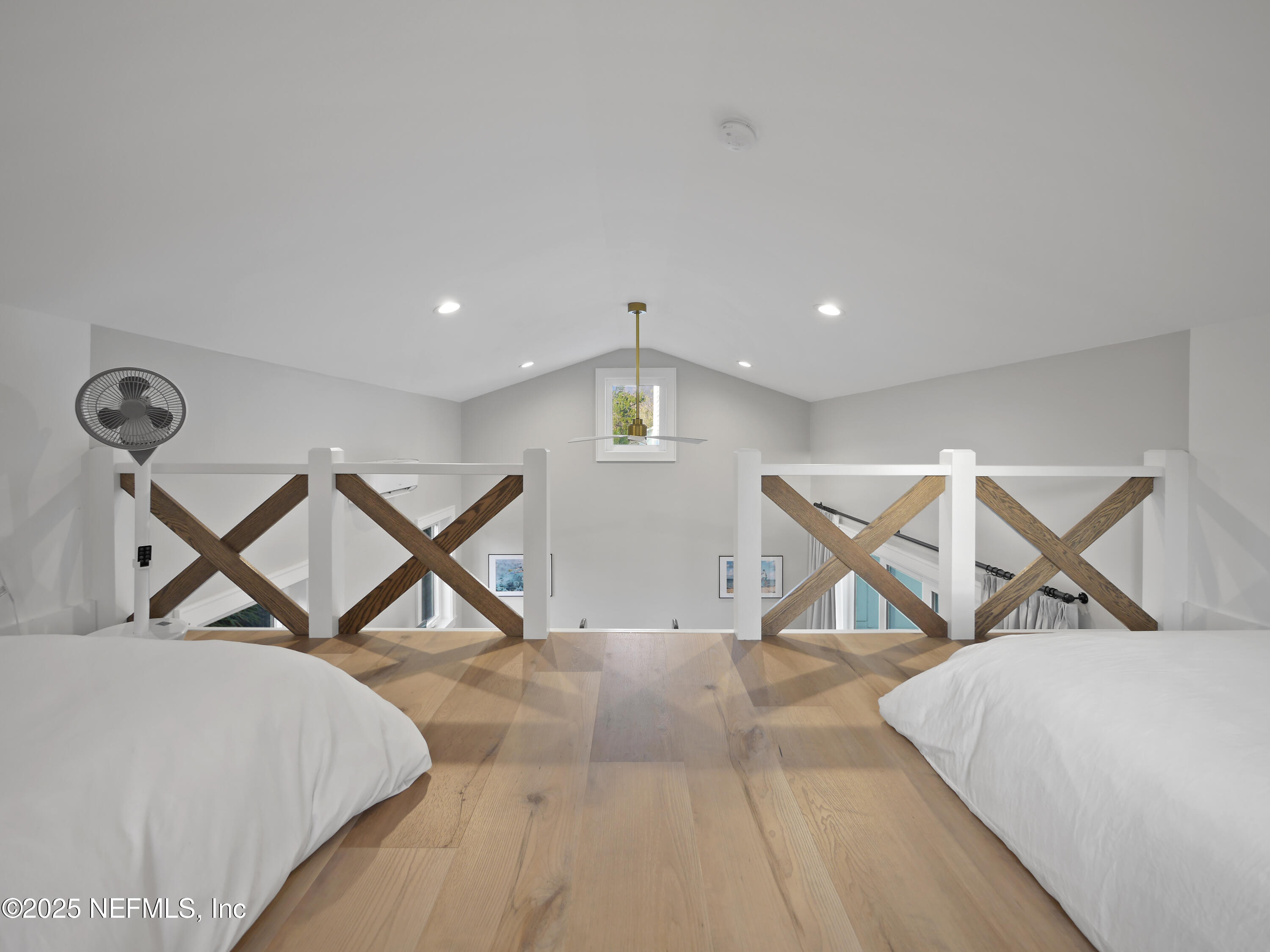 4021 Myrtle Street St. Augustine, FL 32084 - Photo 53 of 68 a bed room with a bed and a wooden floor