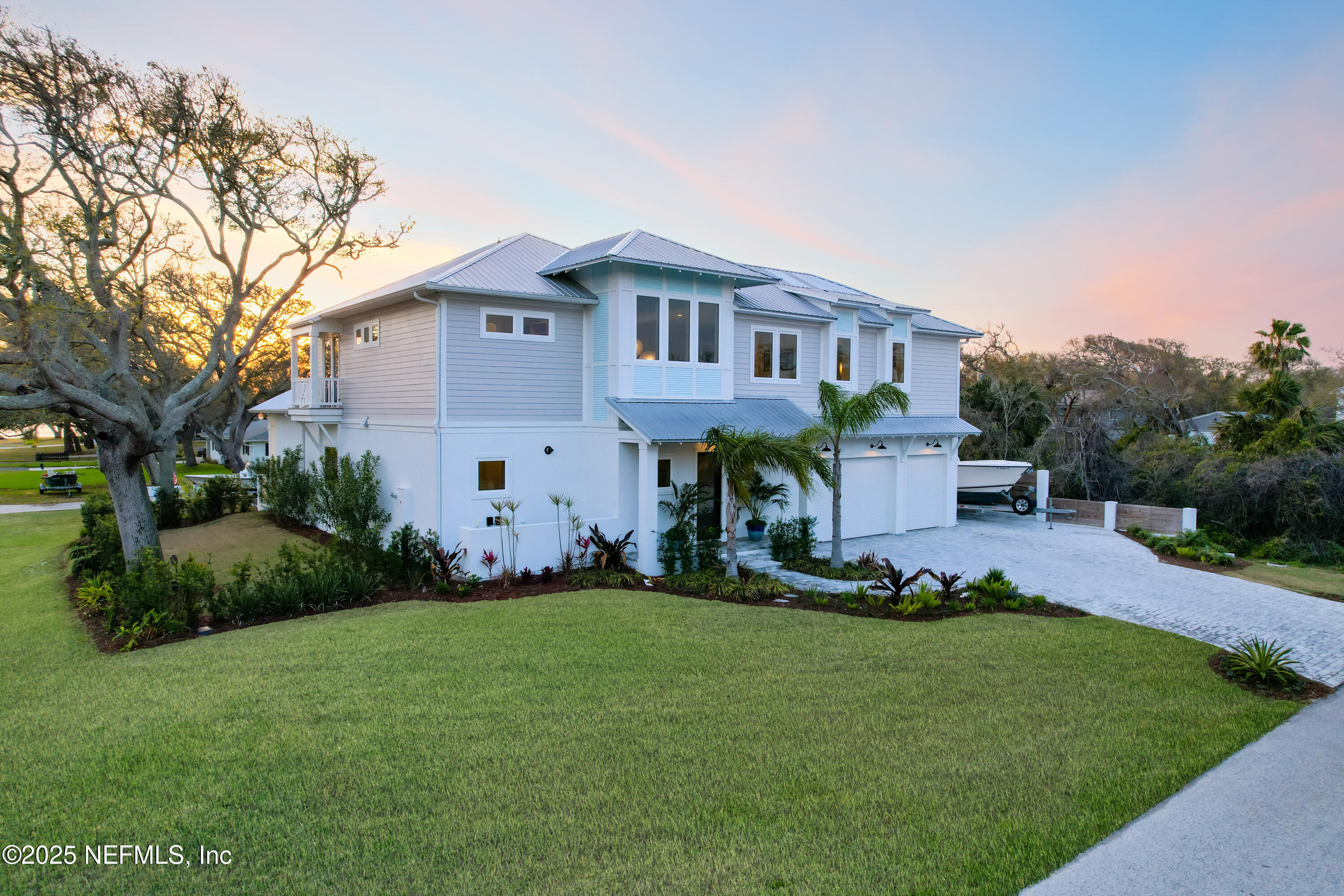 4021 Myrtle Street St. Augustine, FL 32084 - Photo 63 of 68 a front view of a house with a garden