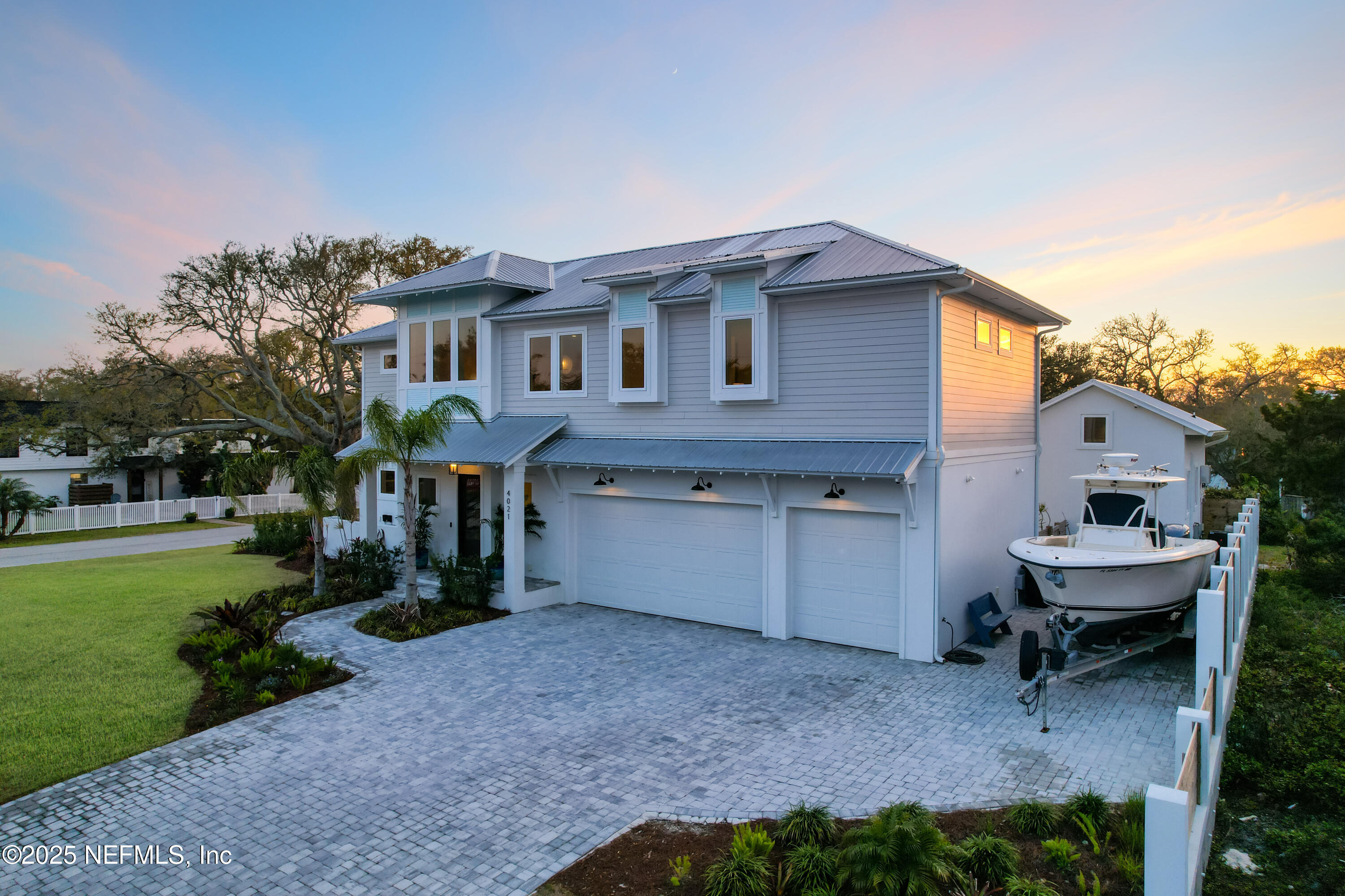 4021 Myrtle Street St. Augustine, FL 32084 - Photo 64 of 68 a view of a house with a yard and sitting area