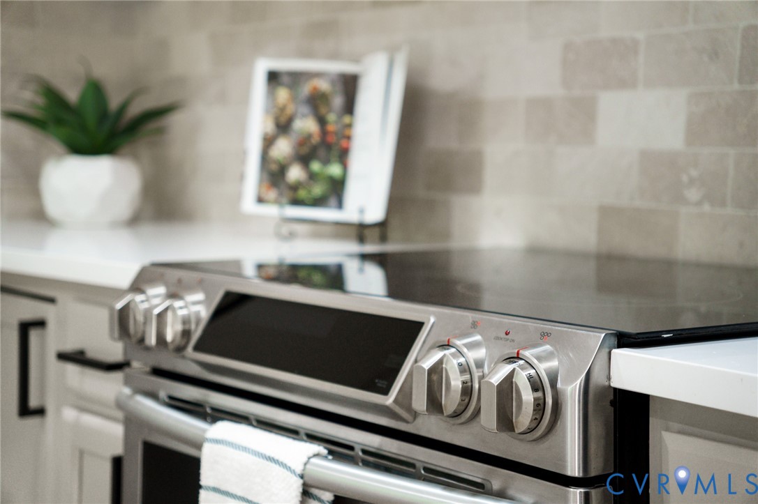 3056 Davis Mill Road Goochland, VA 23063 - Photo 20 of 46 Stainless steel range with a smooth black cooktop
