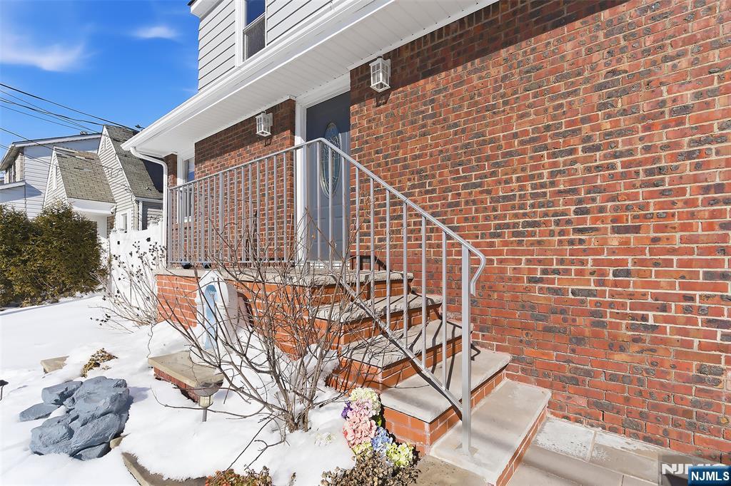 71 Mitchell Street, Unit 2 Lodi, NJ 07644 - Photo 3 of 16 a view of entryway with a brick wall