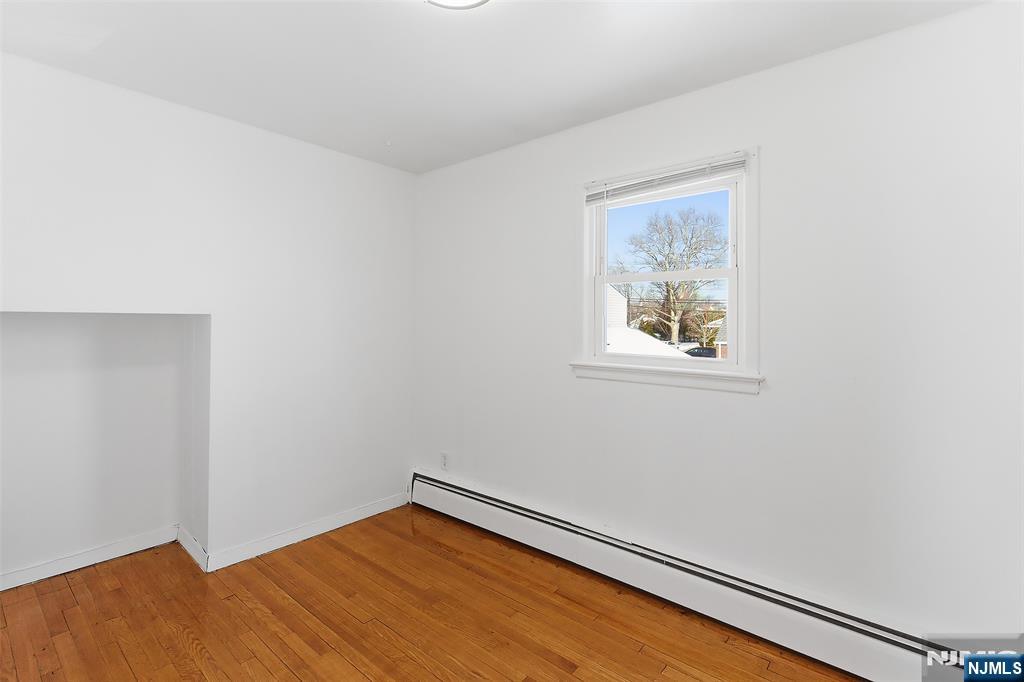71 Mitchell Street, Unit 2 Lodi, NJ 07644 - Photo 9 of 16 an empty room with a window