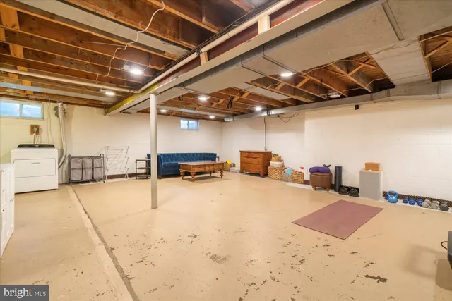 a view of a garage with wooden floor