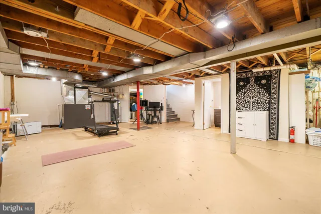a view of a garage with wooden floors