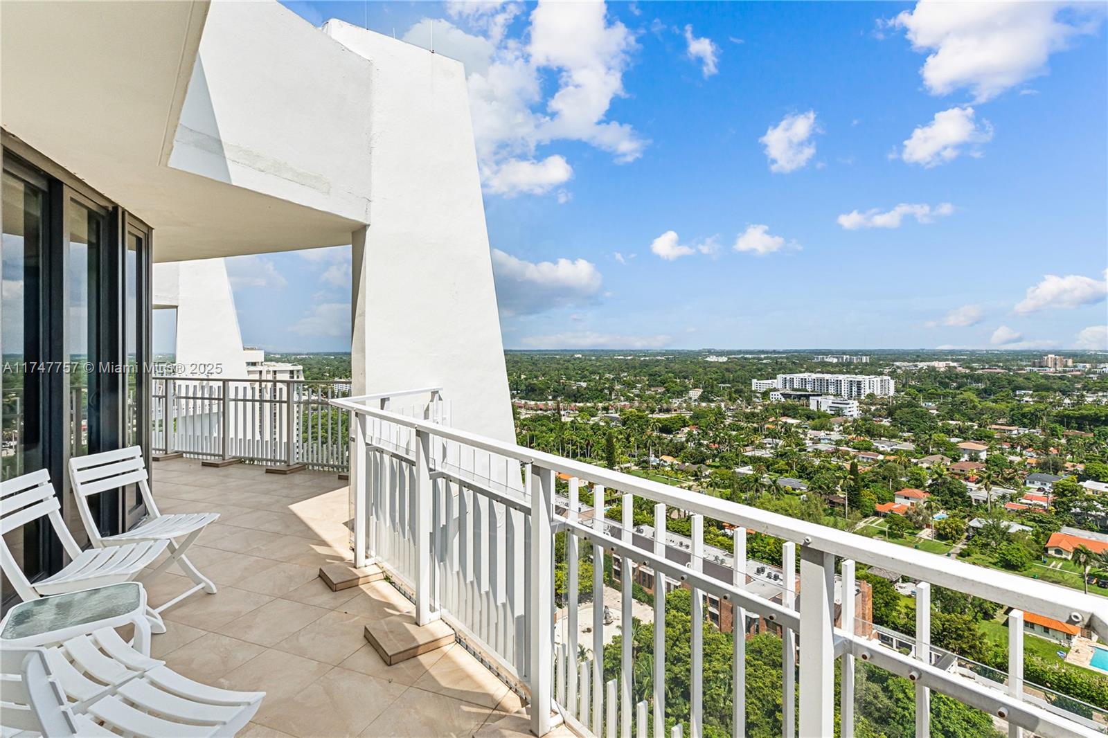 4000 Towerside Terrace, Unit TS3 Miami, FL 33138 - Photo 35 of 49 a view of a chairs and table in the balcony