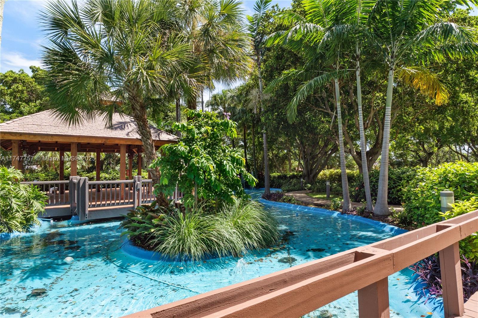 4000 Towerside Terrace, Unit TS3 Miami, FL 33138 - Photo 37 of 49 a view of a garden with a patio