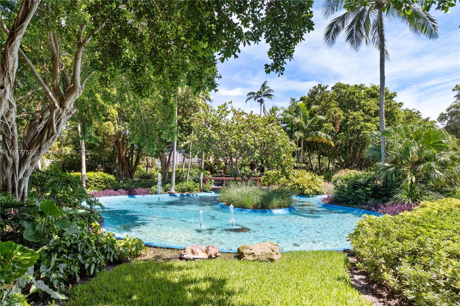 4000 Towerside Terrace, Unit TS3 Miami, FL 33138 - Photo 38 of 49 a view of a garden with potted plants