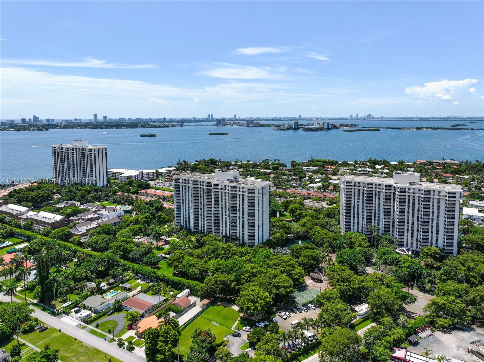 4000 Towerside Terrace, Unit TS3 Miami, FL 33138 - Photo 46 of 49 a view of a lake with tall building in front of it