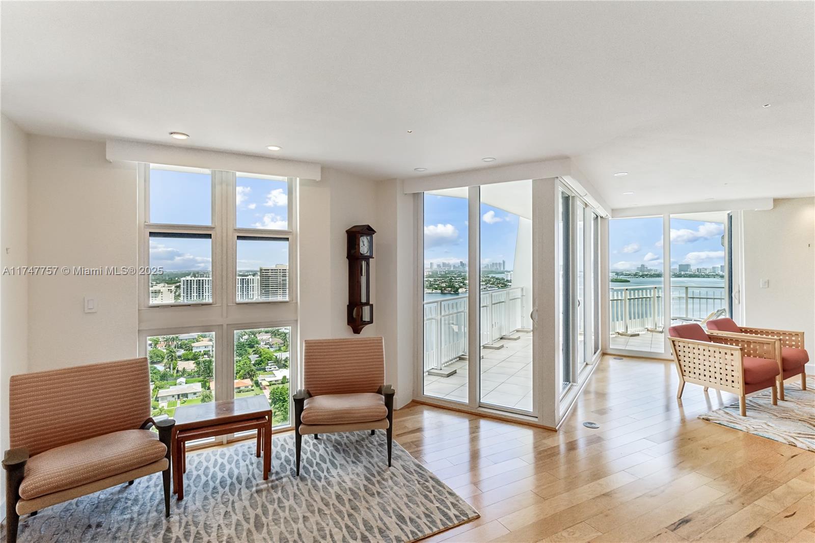 4000 Towerside Terrace, Unit TS3 Miami, FL 33138 - Photo 10 of 49 a living room with furniture and a window with balcony view
