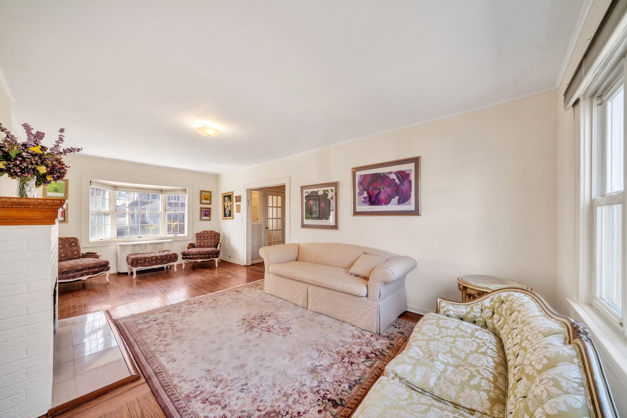 865 Livingston Road Elizabeth, NJ 07208 - Photo 15 of 39 a living room with furniture and a couch
